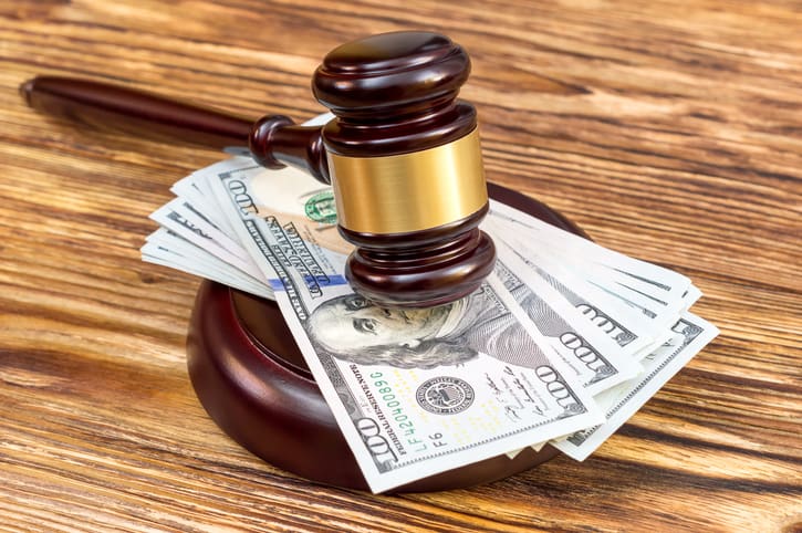 Long Beach attorney discussing divorce attorney fee orders with a client